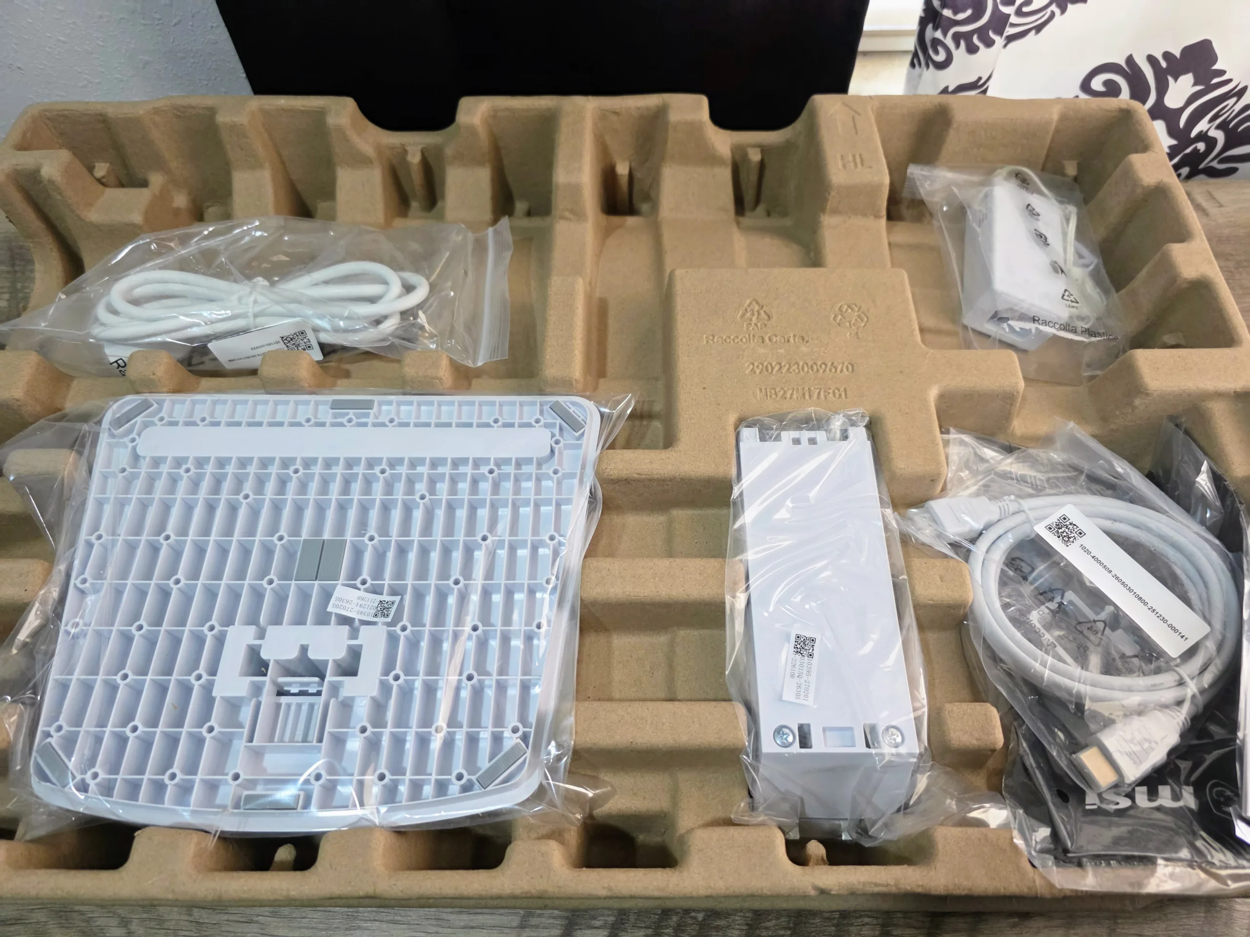 MSI PRO MP273W E14A unboxing, monitor and accessories laid out