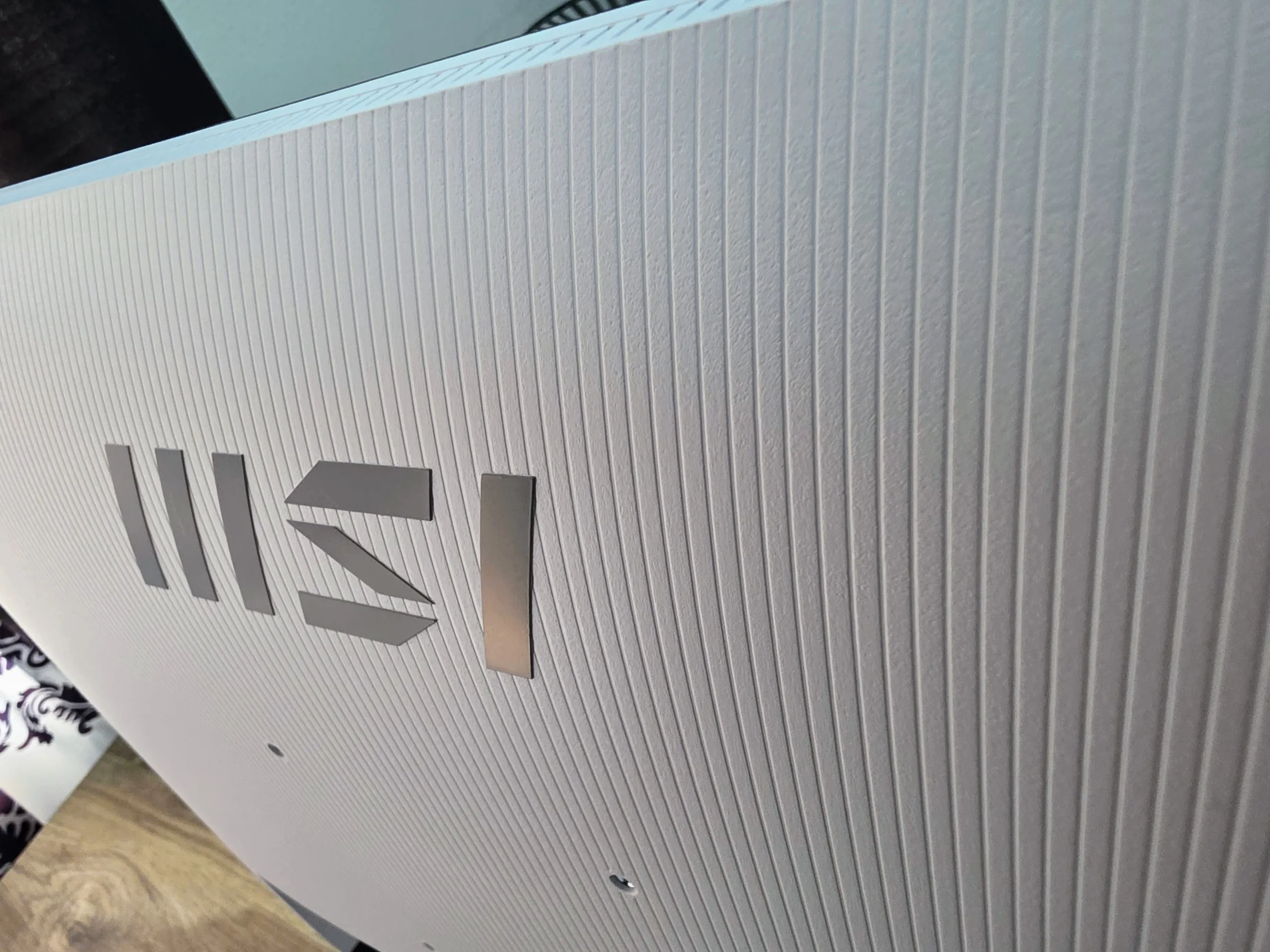 MSI PRO MP273W E14A rear MSI logo detail