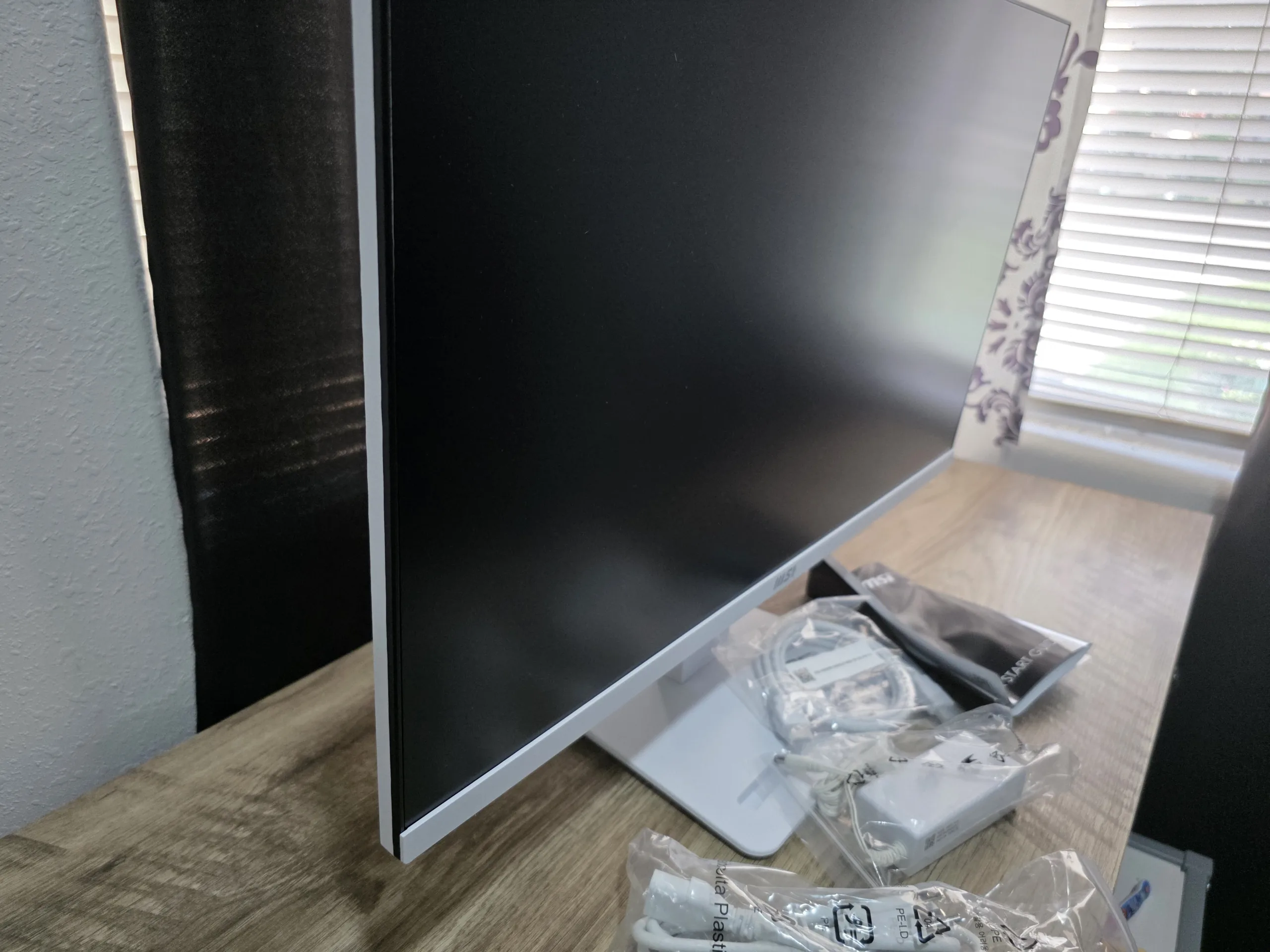 MSI PRO MP273W E14A front angle showing thin bezels