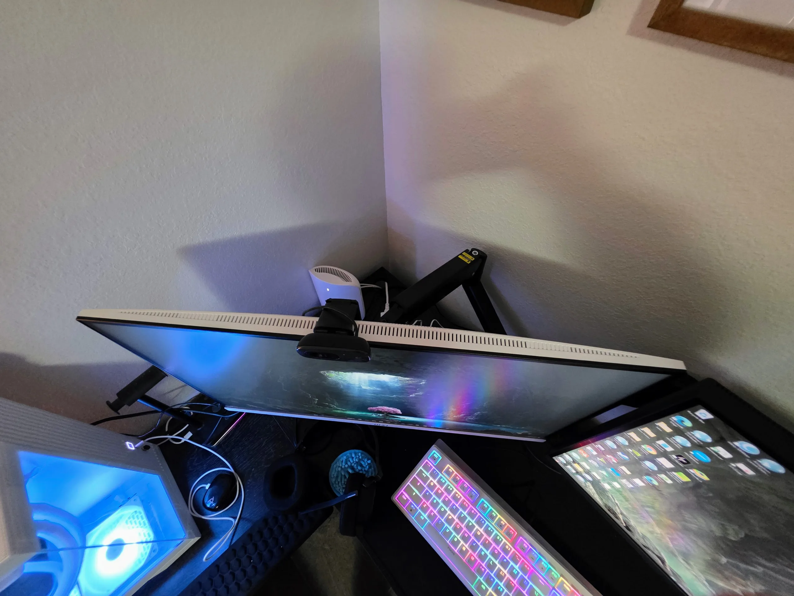 MSI PRO MP273W E14A mounted on a monitor arm
